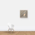 Staples on wood assembled abstractly hung on wall