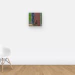 Wall view of pointillist rendering of a chair against a wall with tall windows and fleur-de-lis wallpaper