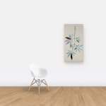 Multicolored collaged hemp leaves hung on wall