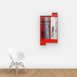 View on wall of stainless steel composition with images printed on it