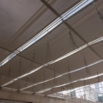 Bundles of wire rope hanging from wire net
