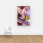 View on wall of image of elderly couple embracing