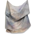 multicolored draped fabric sculpture on wall