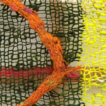 A detail of a striped but organic composition in multi-colored fibers stretched across a redwood frame as one would stretch a painting. The fibers are knit at varying thicknesses so that in places one can see through the stitches to the wall behind