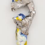 a sculpture resembling a question mark