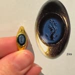 *, A pair of Art Déco coral, onyx and diamond ear pendants, circa 1925