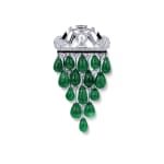 An Art Déco emerald, onyx and diamond brooch