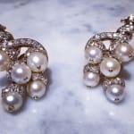 RENE BOIVIN, A pair of cultured pearl and diamond ear clips, 1950s