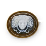 An agate cameo, gold and enamel brooch