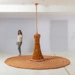 Neto sculpture hanging from the ceiling