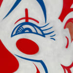 Close up of Red and blue graphic clown face against white background