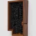 an ink of computer circuit board sculpture on a white wall