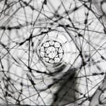 tomas saraceno hanging sculpture with plants