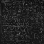 a detail of a black and white panel drawing of how to draw a tea cup on a white wall