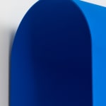 large blue wave sculpture