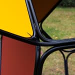 a large scale module sculpture in a green park