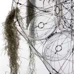 tomas saraceno hanging sculpture with plants