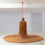 Neto sculpture hanging from the ceiling