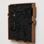 an ink of computer circuit board sculpture on a white wall
