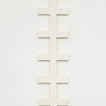 white and yellow ladder sculpture