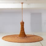 Neto sculpture hanging from the ceiling