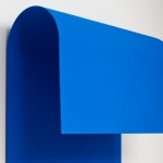 large blue wave sculpture