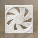 a marble fan sculpture on a neutral floor