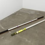 two painted rods on the floor