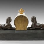 Patinated and Gilt Bronze Mounted Marble Mantel Timepiece