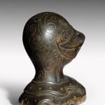 Coulborn antique patinated carved wood armet