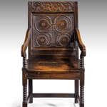 Coulborn antique Charles II Joined Oak Panel Back Open Armchair
