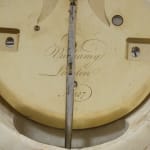 Patinated and Gilt Bronze Mounted Marble Mantel Timepiece