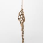 Mire Lee, Untitled (hanging burlap piece with many holes), 2022–2023