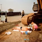 Martin Parr, Sunbathing by digger, New Brighton, England, 1983-85