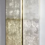 Silver, mixed leaf panels hung on wall