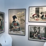 Framed Geisha Girl prints hung on wall