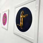 Gold & black rebel with the paws cat glitter sculpture print holding guns framed on the wall