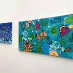 Two cartoon street style art landscape painting hung on gallery wall