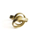 Sculptural ring and pendant – curling crest of a wave – in 18 kt Fairtrade Gold by ethical jewellery artist Ute Decker