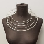 Tribal neck piece – dancing tribal - in recycled silver by contemporary tribal jewellery artist Ute Decker