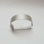 architectural bracelet – squaring the circle - in recycled silver by architectural jewelry artist Ute Decker