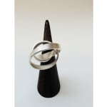 Sculptural ring – curling crest of a wave small – 100% recycled silver by contemporary jewellery artist Ute Decker