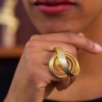 Sculptural ring – rose #2 – in 18 kt Fairtrade Gold by contemporary jewellery artist Ute Decker