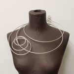 Contemporary art jewellery - stellar movements statement necklace in 100% recycled silver by jewellery artist Ute Decker