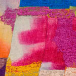 detail of purple and pink paint pushed through burlap