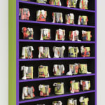 large cabinet with multiple small ceramic cups inside its shelves