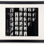 Framed black and white contact sheet showing a series of photographs of artist Andy Warhol on the phone