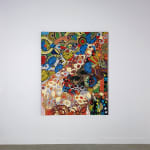 Colorful artwork comprised of oil paint and patterned fabric canvas in a "neo-African abstract expressionist" mode on a white wall