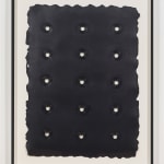 A framed piece of thick black paper with organic rough edges is penetrated by a neat array of fifteen grommets