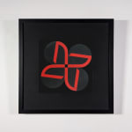 Acrylic on ragboard of quatrefoil shape in bright red, and dark grey against a black background mounted on a white wall